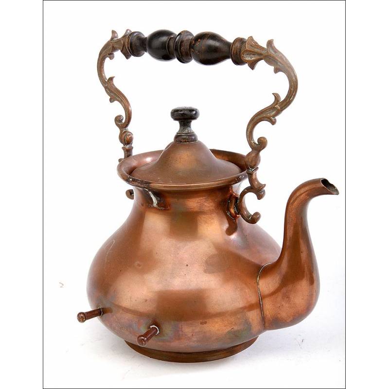 https://www.antiguedades.es/101813-large_default/beautiful-copper-teapot-with-art-nouveau-decoration-complete-circa-1920-1940.jpg