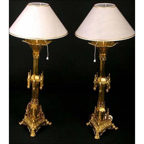 Pair of 19th century church candlesticks in bronze. Electrified