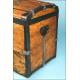 Antique trunk with metal reinforcements.