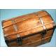 Antique trunk with metal reinforcements.