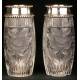 Pair of crystal vases with solid silver rim.