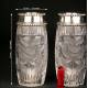 Pair of crystal vases with solid silver rim.