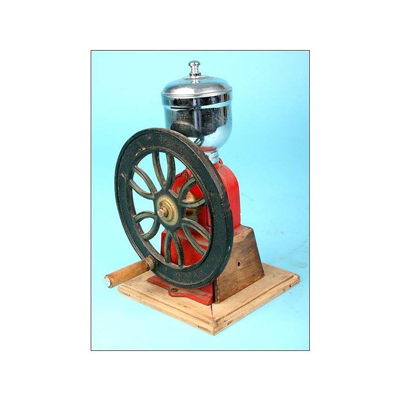 Wheel coffee grinder. Antique