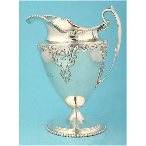 Silver milk jug. 1895