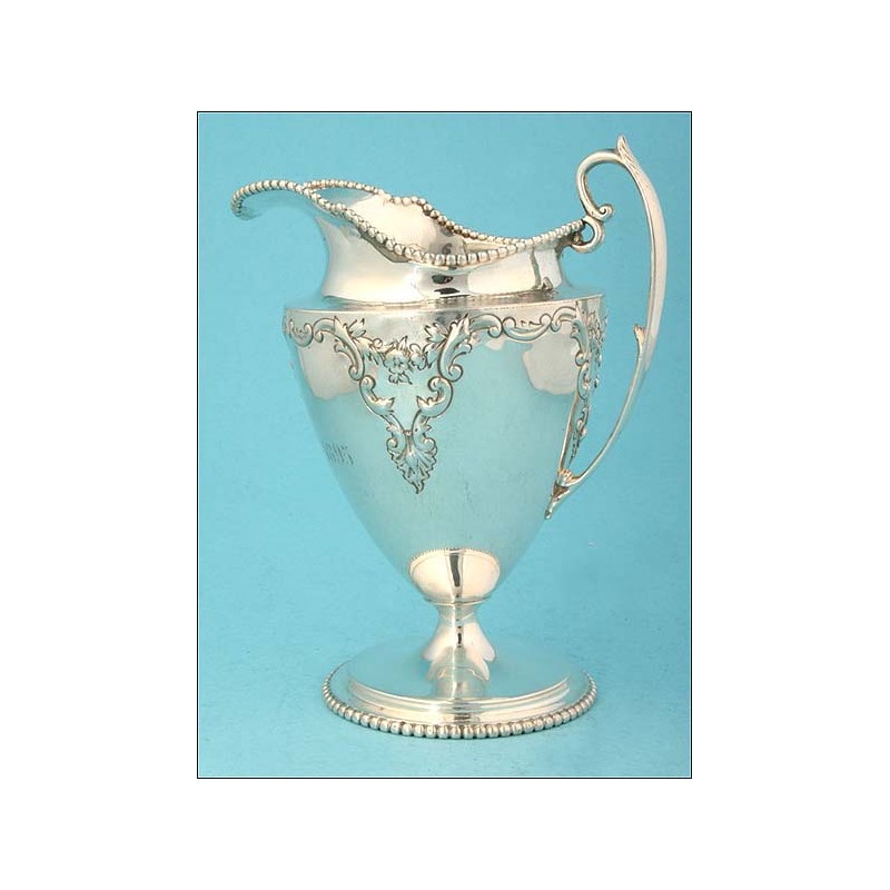 Silver milk jug. 1895