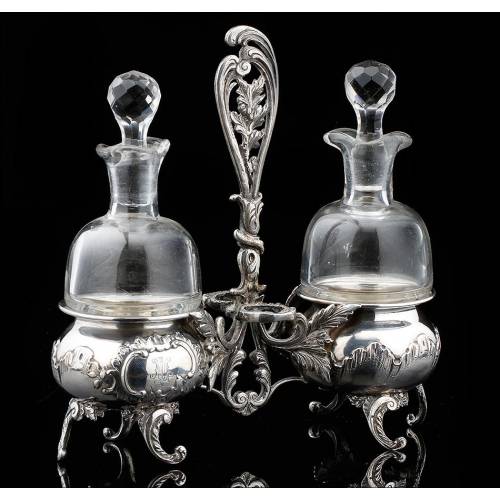 Small silver and blown glass cruets, 19th-20th century.