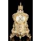 Antique set of mantel clock and pair of candlesticks. France, 19th Century