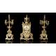 Antique table clock with candlesticks. France, 19th Century