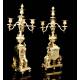 Antique table clock with candlesticks. France, 19th Century