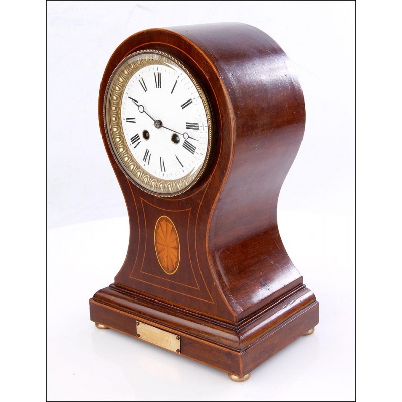 Antique Mahogany mantel clock. France, 19th Century