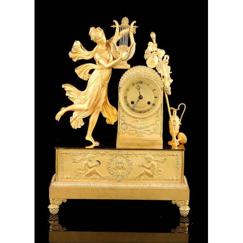 Antique Mantel Clock in Gilded Bronze. France, 1850