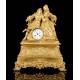 Antique Mantel Clock in Gilded Bronze. France, 1850