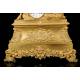 Antique Mantel Clock in Gilded Bronze. France, 1850