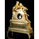 Antique Mantel Clock in Gilded Bronze. France, 1850