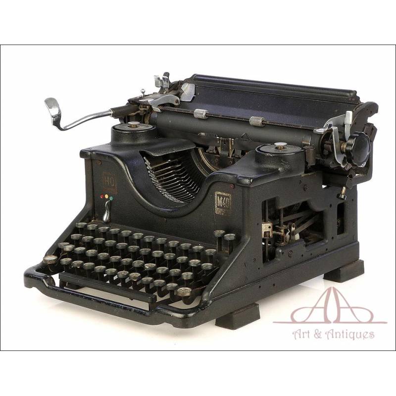 https://www.antiguedades.es/128183-large_default/antigua-maquina-de-escribir-hispano-olivetti-m40-teclado-espanol-circa-1930.jpg
