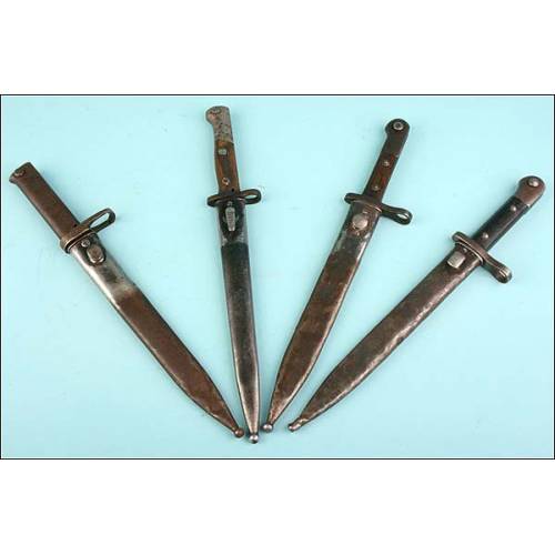 Lot of 4 bayonets for Mauser rifle.
