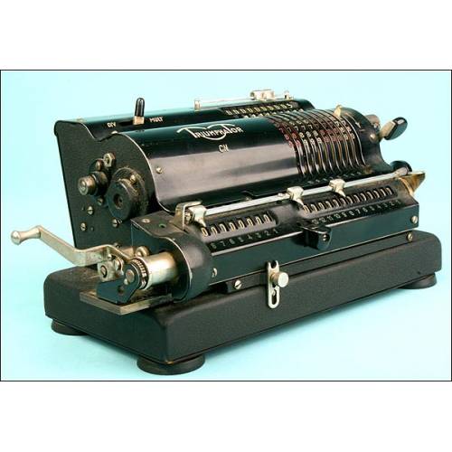 Calculadora Mecánica Triumphator. Años 30, con Libreto de Instrucciones