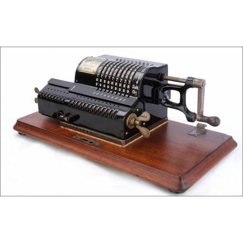 Antique Dactyle Calculator with Wooden Base and Working. France, 1908