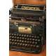 Antique Continental typewriter with chest and key. 1920