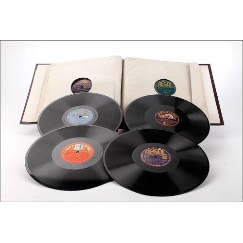 Album with 12 gramophone records. 78 rpm. Varied subject matter. Original vintage album.