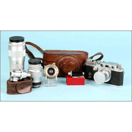Gran lote Leica. Leica III c de 1942, varios objetivos y accesorios originales