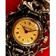 Precioso Reloj-Joya para Dama en Plata Maciza y Granates. Bartel & Sohn, Alemania siglo XIX.