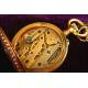 French 18kt gold pendant watch.