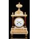 Beautiful antique mantel clock in marble and bronze. France, Circa 1870