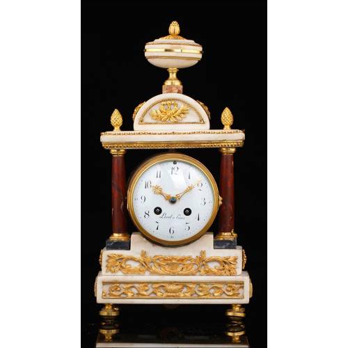 Beautiful antique mantel clock in marble and bronze. France, Circa 1870