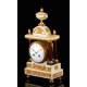 Beautiful antique mantel clock in marble and bronze. France, Circa 1870