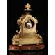 Antique French Mantel Clock in Gilt Bronze. S.XIX.