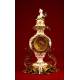 Decorative Baroque Pendulum Mantel Clock in Metal and Bronze. S.XIX.