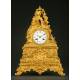 Precious French Clock in Gilded Bronze. 1st Half s. XIX. Well preserved and working