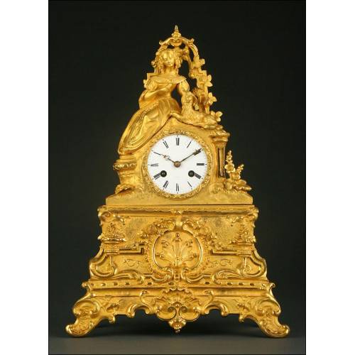 Precious French Clock in Gilded Bronze. 1st Half s. XIX. Well preserved and working