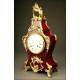 Magnificent mantel clock in wood and tortoise shell. XIX Century.