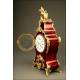 Magnificent mantel clock in wood and tortoise shell. XIX Century.