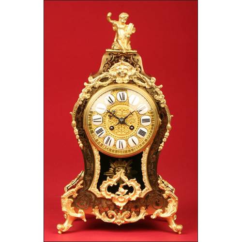Impressive Boulle Mantel Clock in Tortoiseshell, S.XIX.