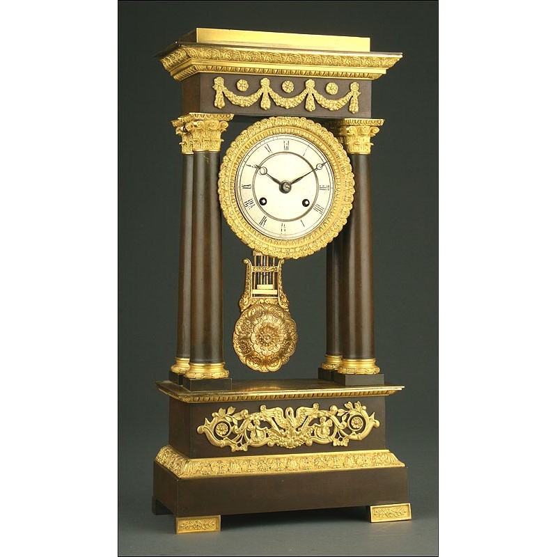 Elegant French Portico Clock in Gilt Bronze, ca. 1860.