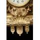 Spectacular Clock and Candelabra Set in gilded bronze. France, XIX Century