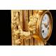 Delicate Mantel Clock in Gilded Bronze with Cupid. France, XIX Century