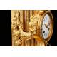 Delicate Mantel Clock in Gilded Bronze with Cupid. France, XIX Century