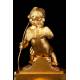 Delicate Mantel Clock in Gilded Bronze with Cupid. France, XIX Century