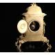 Elegante Reloj de Sobremesa de Bronce. Francia, Siglo XIX. Funcionando