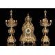 Conjunto de Reloj y Pareja de Candelabros en Bronce Dorado. Francia, S. XIX. Funcionando