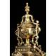 Set of Clock and Pair of Candlesticks in Gilded Bronze. France, S. XIX. Working