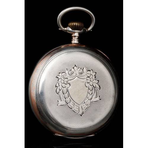 Elegante Reloj de Bolsillo Omega de Plata Maciza y con Contrastes. Suiza, Circa 1920
