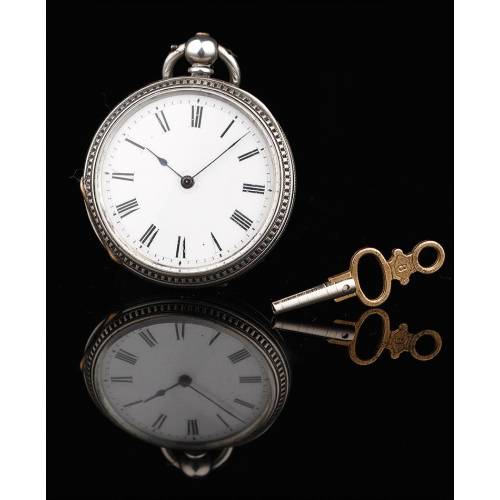 Reloj Inglés de Plata con Llave Original. Año 1870, en Buen Estado y Funcionando Perfectamente