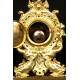 Reloj de bronce antiguo con guarnición. Sonería. S. XIX
