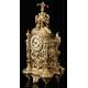 Beautiful bronze mantel clock with pendulum. France, 19th Century