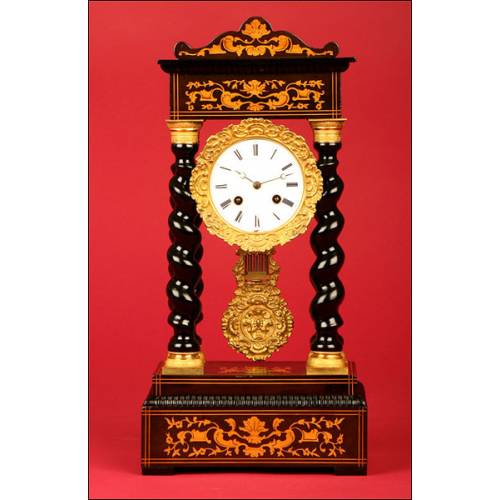 Beautiful French Portico Clock with Marquetry and Gilded Bronze. 1870.